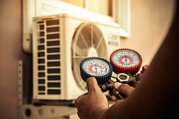 Professional Air Conditioning Service technician working in Temecula, CA